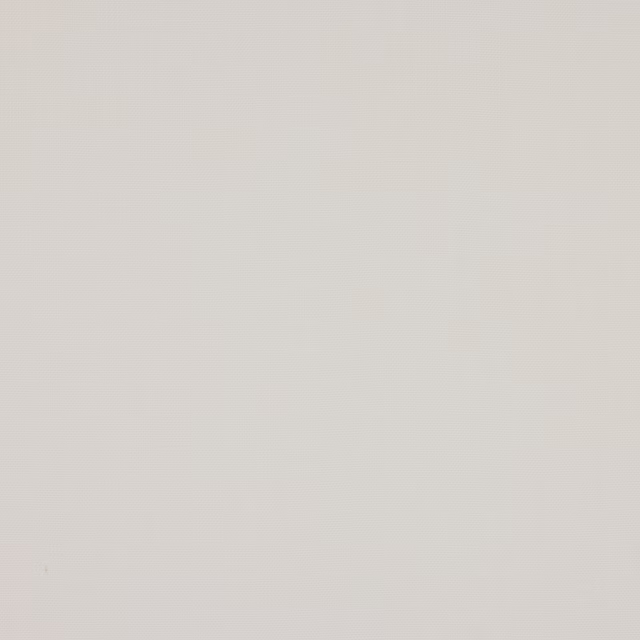 Soft warm white plain linen fabric swatch with fine subtle weave