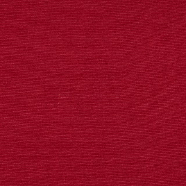 Deep carmine red plain linen swatch with fine woven texture