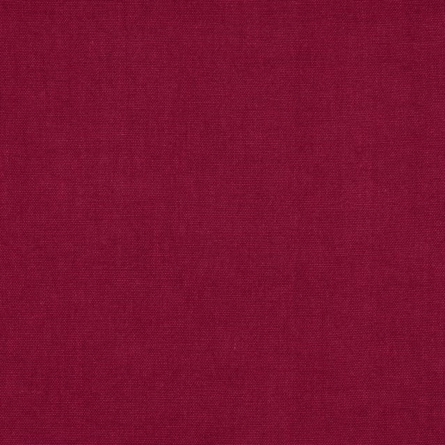 Deep raspberry red plain linen fabric swatch with fine weave