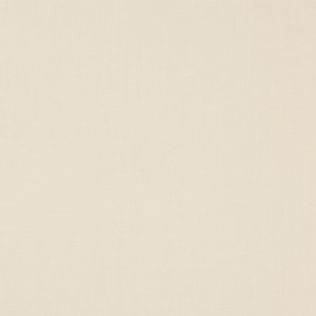 Close-up of soft warm ivory plain linen fabric with fine natural texture