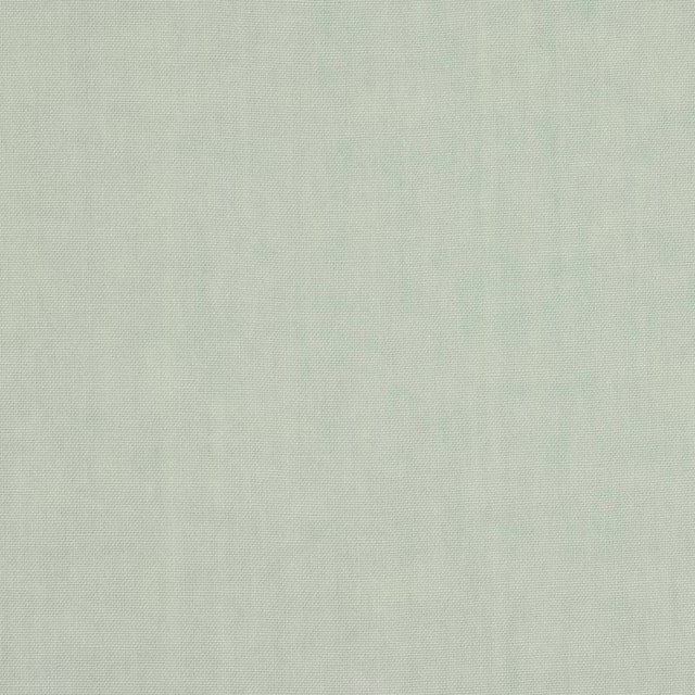 Pale opaline mint linen fabric with a fine plain weave texture
