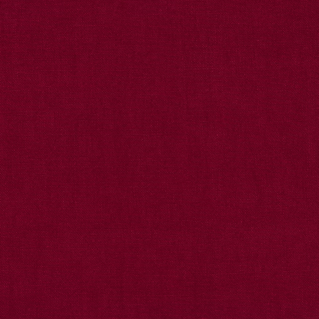 Deep berry red plain linen fabric with a fine matte weave