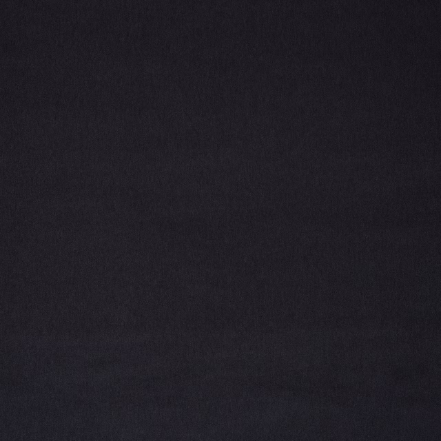 Dark gunmetal charcoal fabric swatch with a soft matte woven texture