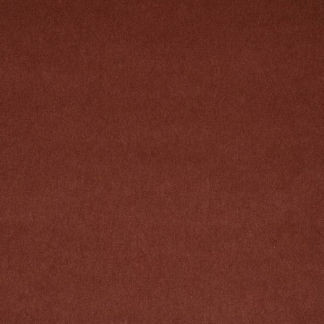 Close-up of a deep rosewood-brown plain woven fabric with soft texture