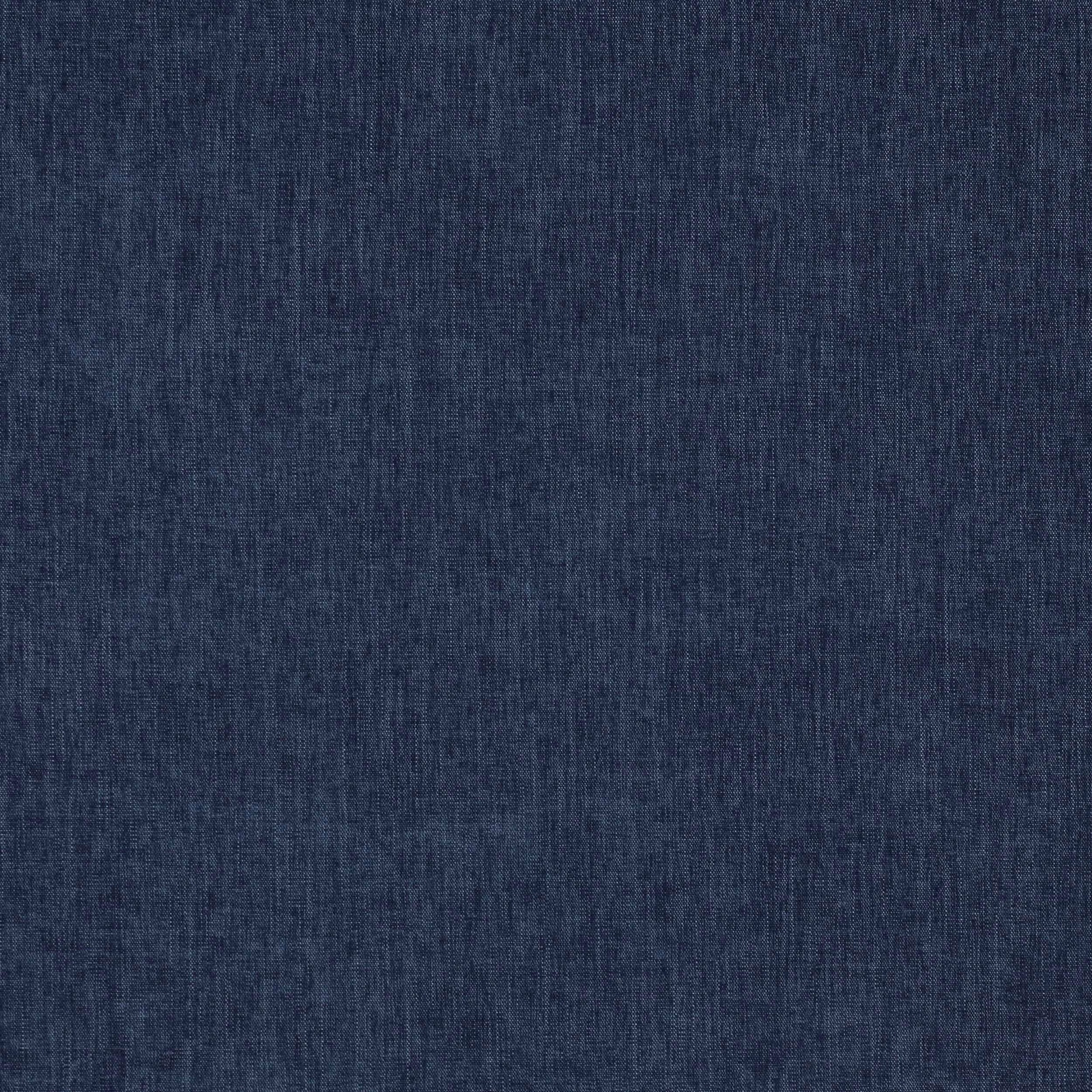 Close-up of deep indigo woven fabric with a fine denim-like texture