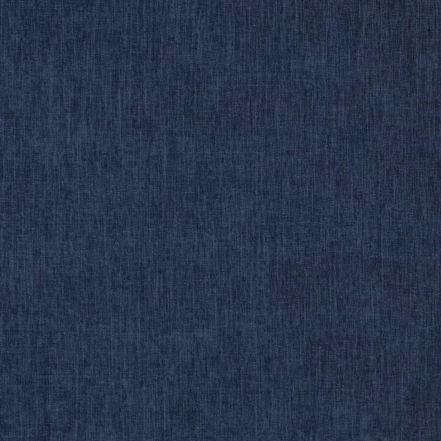 Close-up of deep indigo woven fabric with a fine denim-like texture
