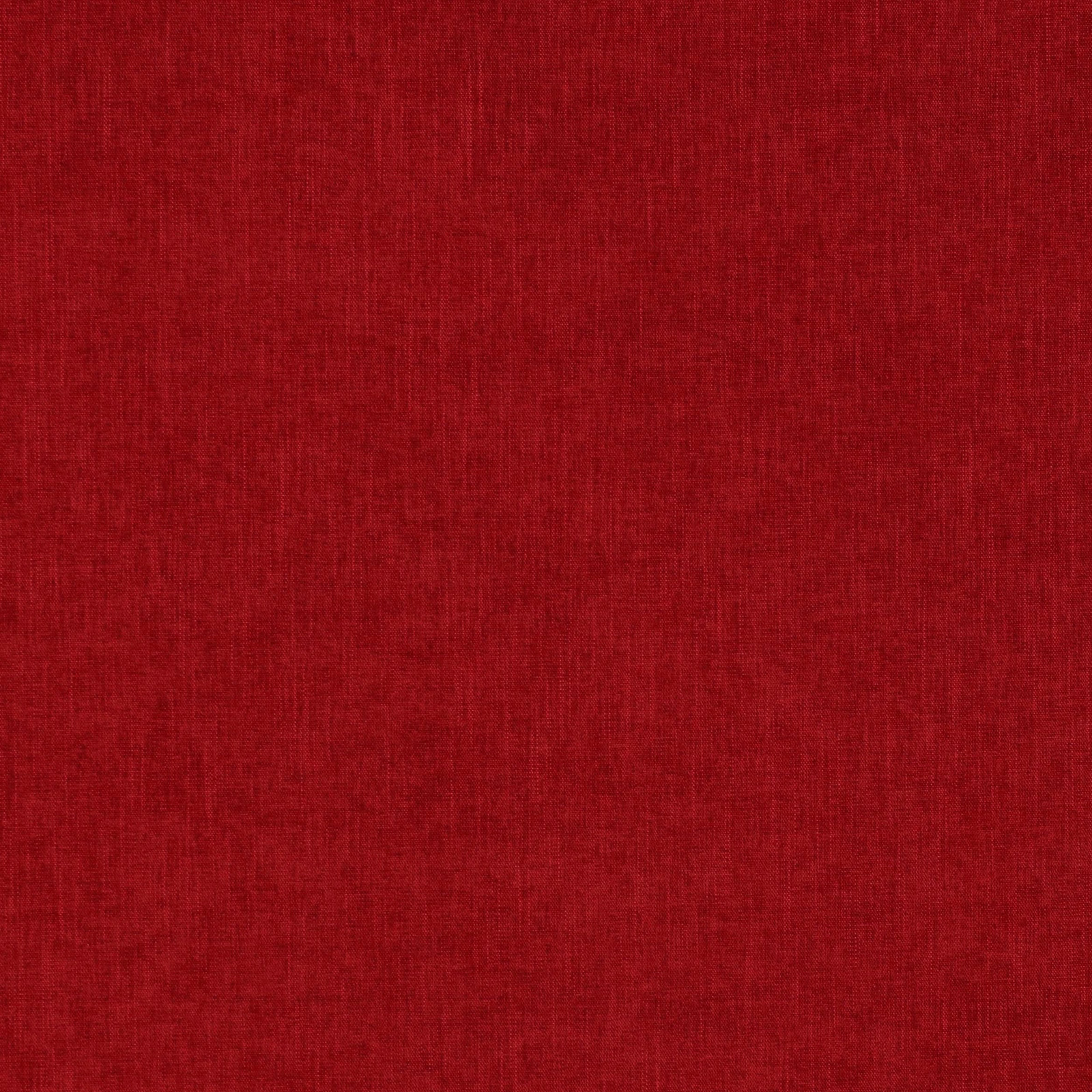 Swatch of vivid pillar box red plain woven fabric with fine textured surface