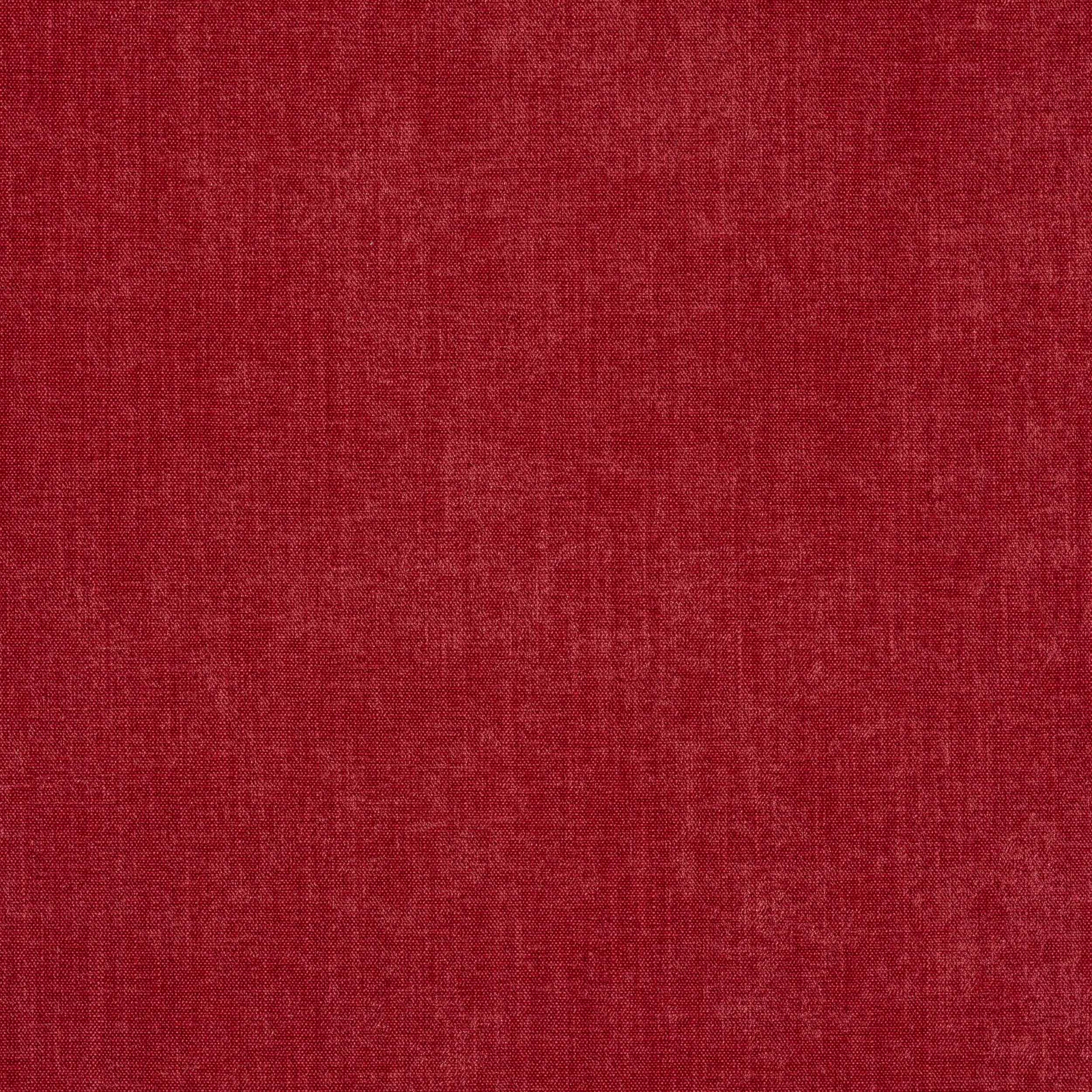 Close-up of soft muted red woven fabric with a fine matte texture