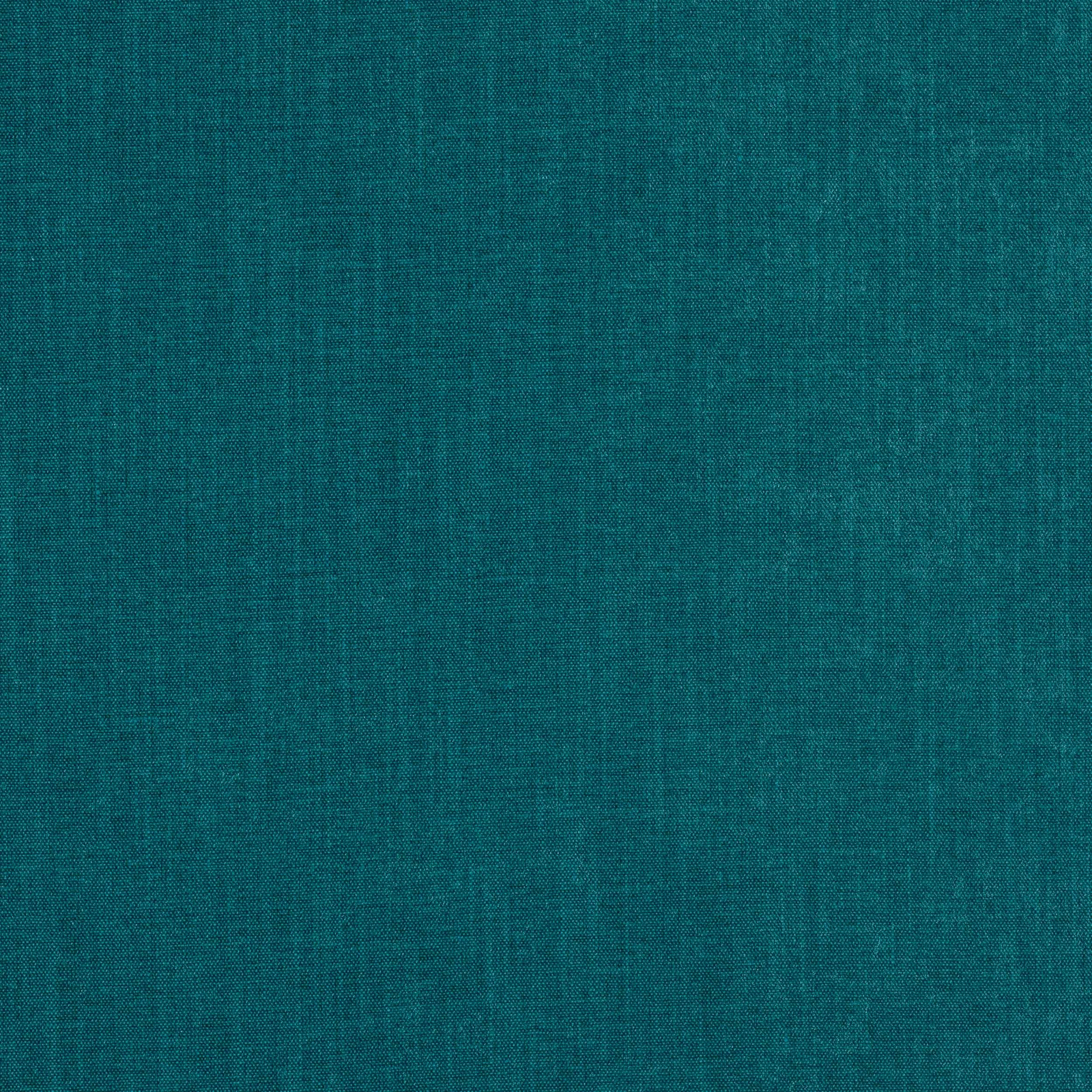 Close-up of a deep turquoise plain woven fabric with fine texture