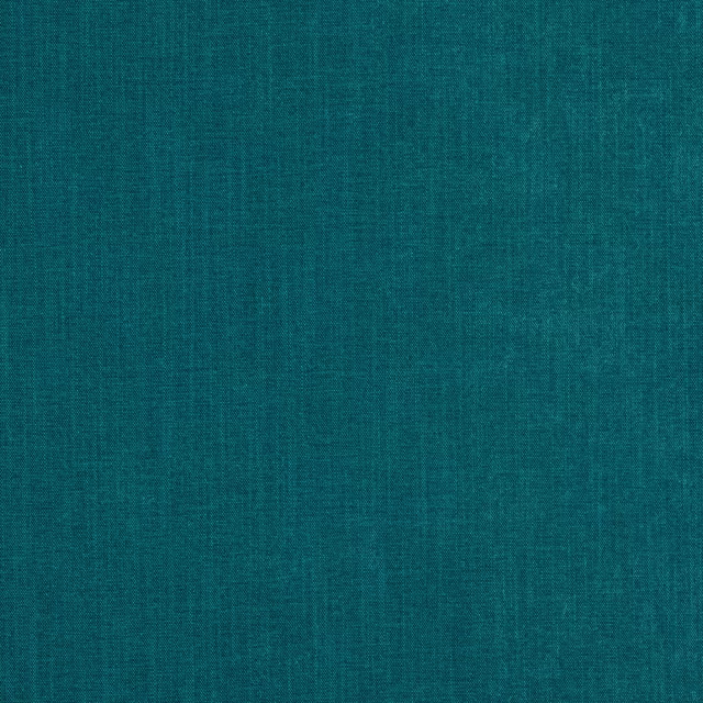 Close-up of a deep turquoise plain woven fabric with fine texture