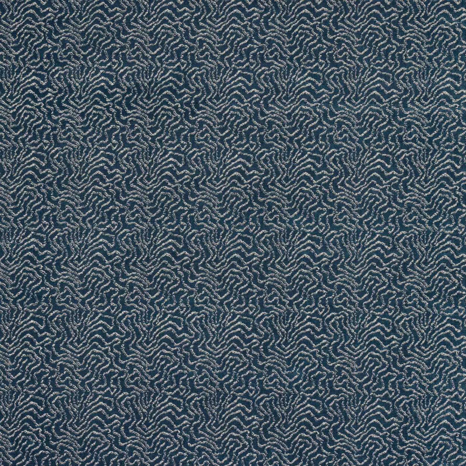 Blue abstract woven fabric with a small pale pattern on a cobalt ground