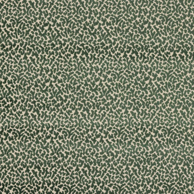 Close-up of green and beige small-scale animal print fabric swatch