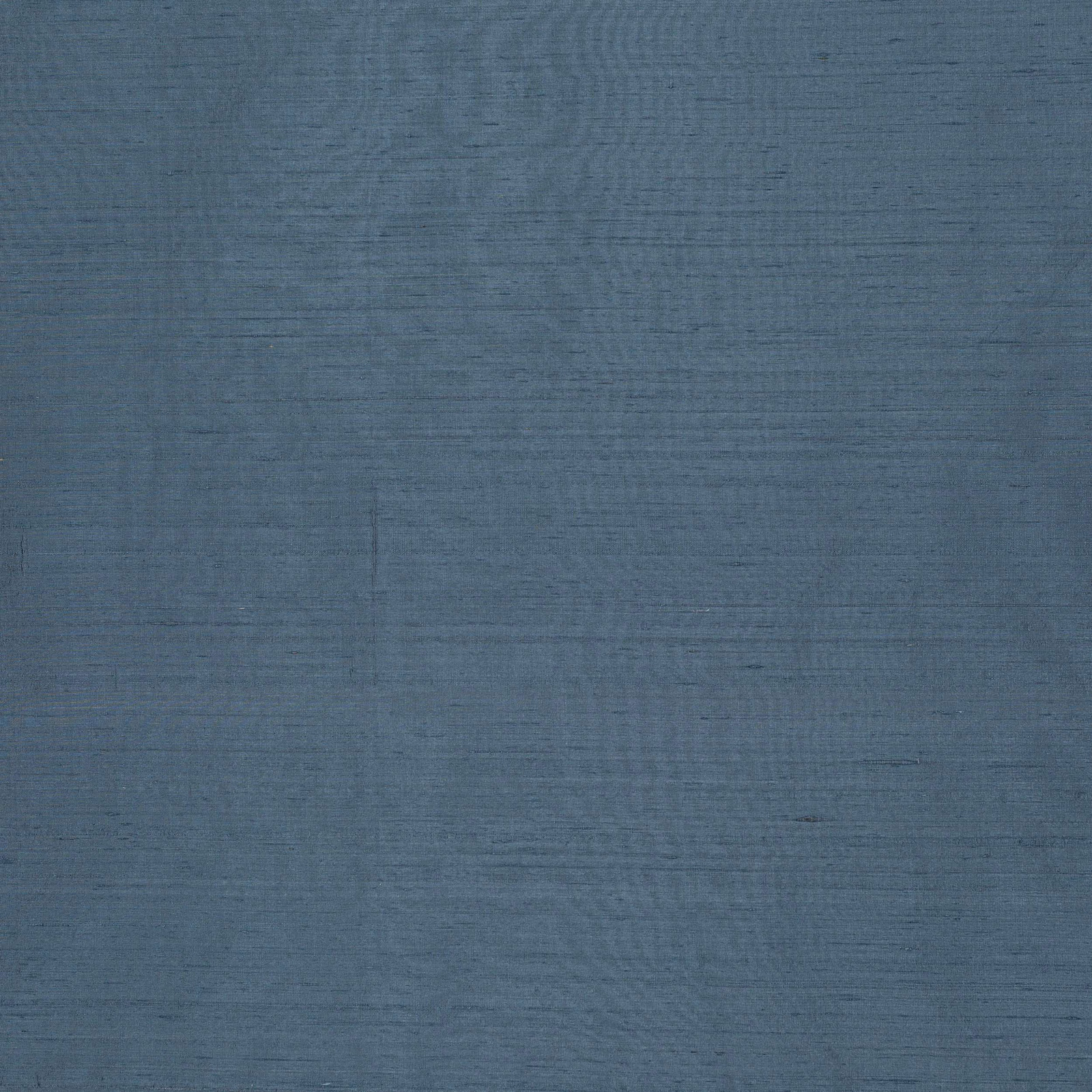 Muted denim-blue silk swatch with subtle horizontal texture and soft sheen