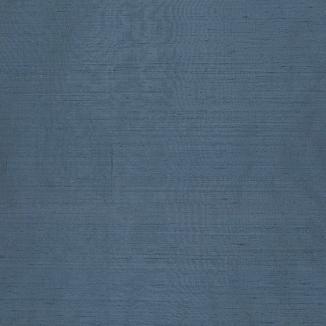 Muted denim-blue silk swatch with subtle horizontal texture and soft sheen