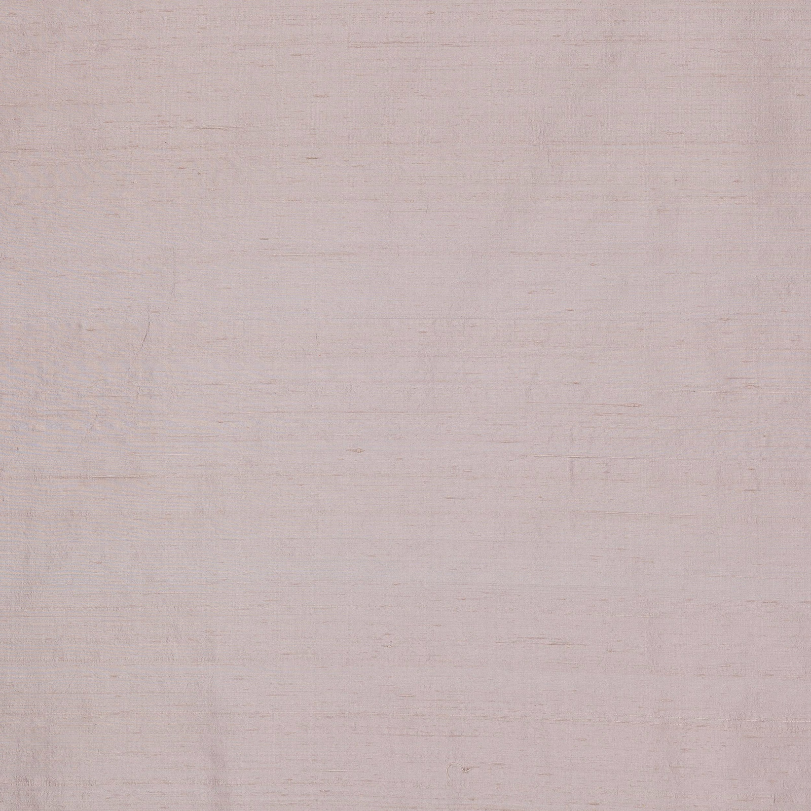 Pale blush pink silk fabric with a soft lustre and fine slub texture
