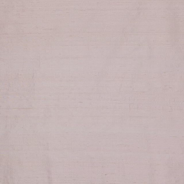 Pale blush pink silk fabric with a soft lustre and fine slub texture
