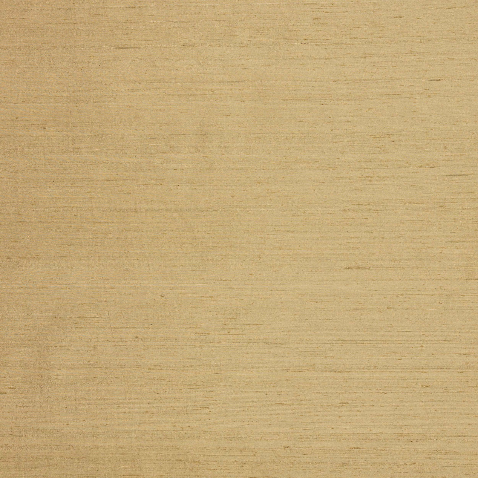 Close-up of soft straw-gold silk with fine horizontal slubs and subtle sheen