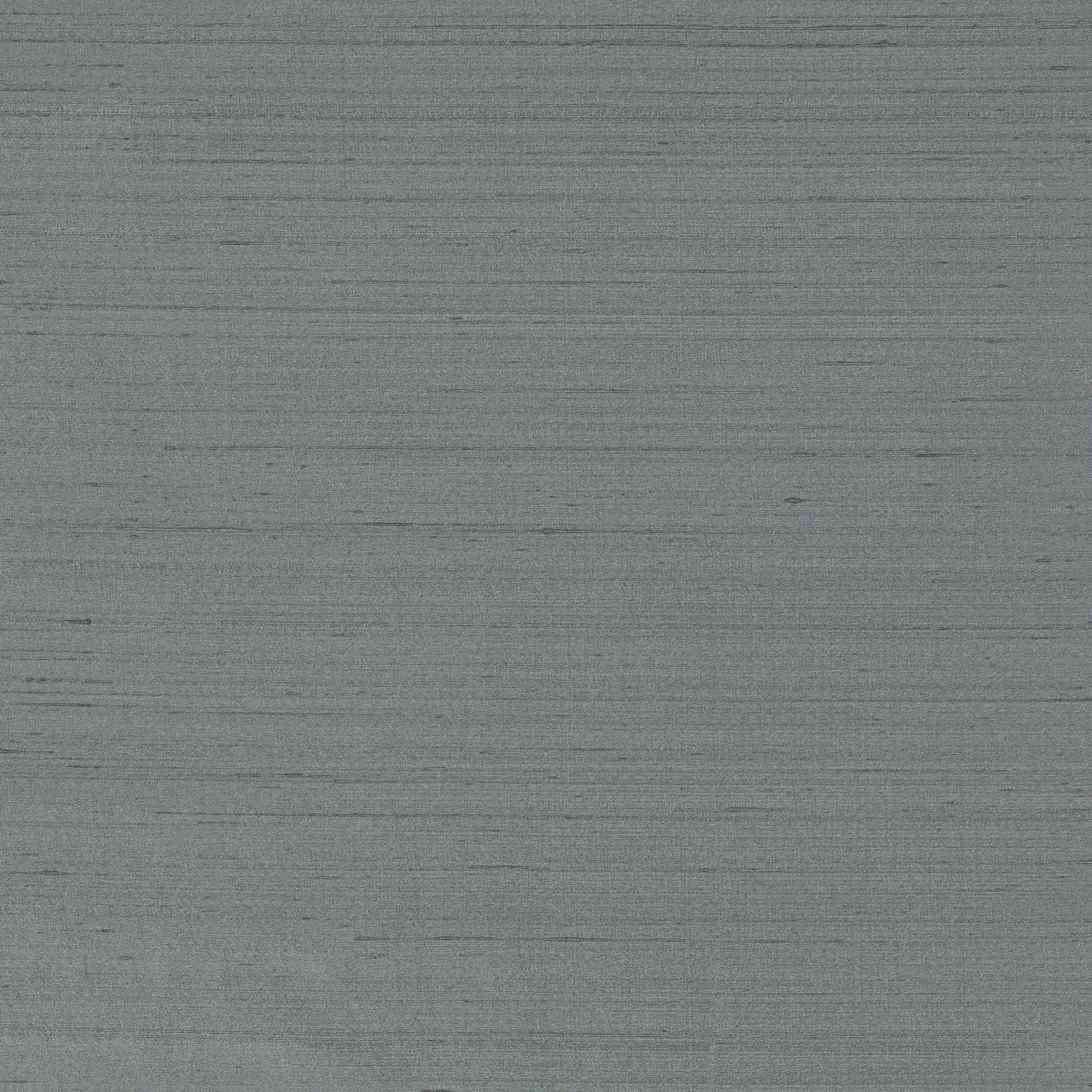 Soft slate-blue silk with subtle horizontal slubs and a gentle sheen