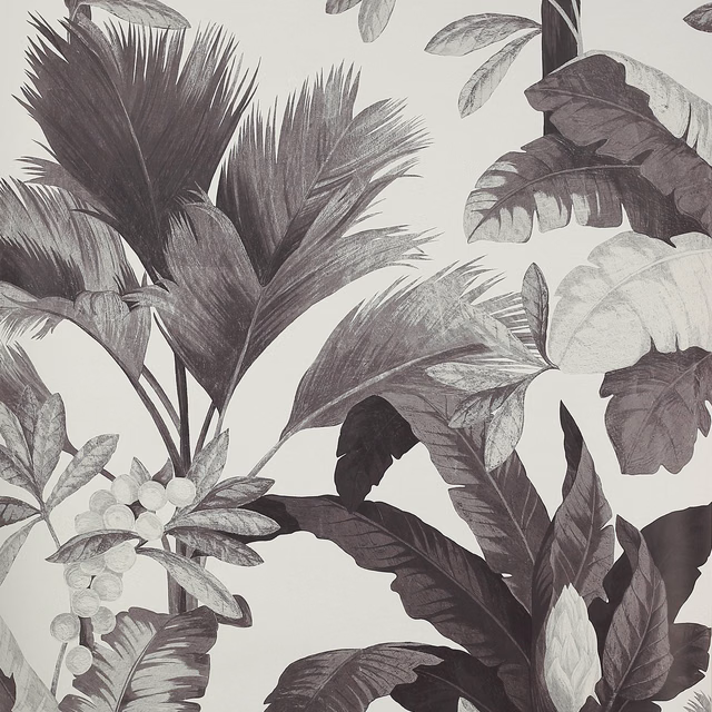 Charcoal and silver-grey tropical leaves on an ivory ground, shown in close-up