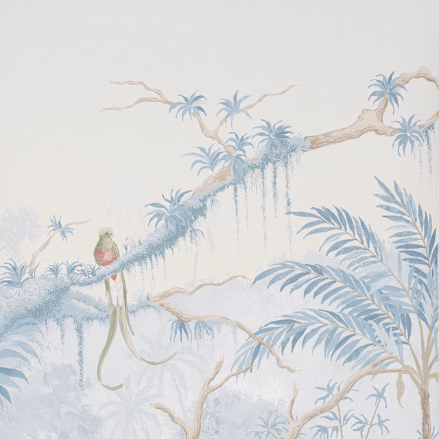 Pale blue scenic jungle wallpaper with palms, foliage, bare branches and a parrot