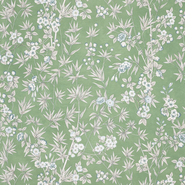 Muted matcha green wallpaper with white blossoms and delicate bamboo-like leaves