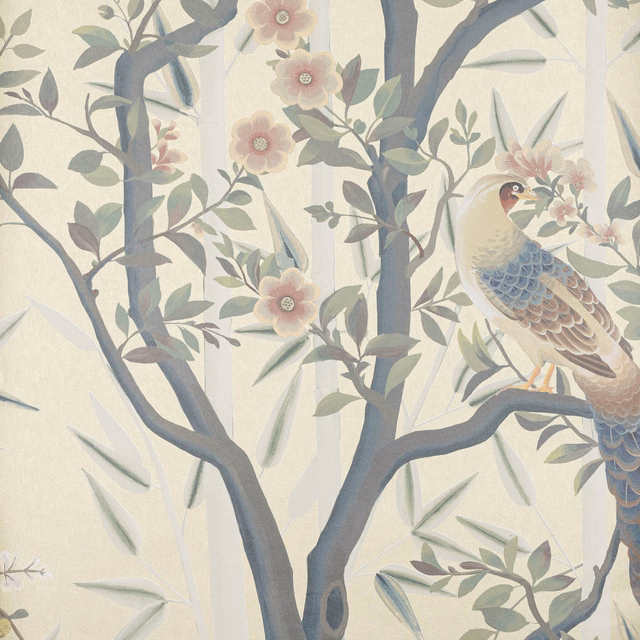 Muted old-gold botanical wallpaper with blue-grey branches, pink flowers and a perched bird