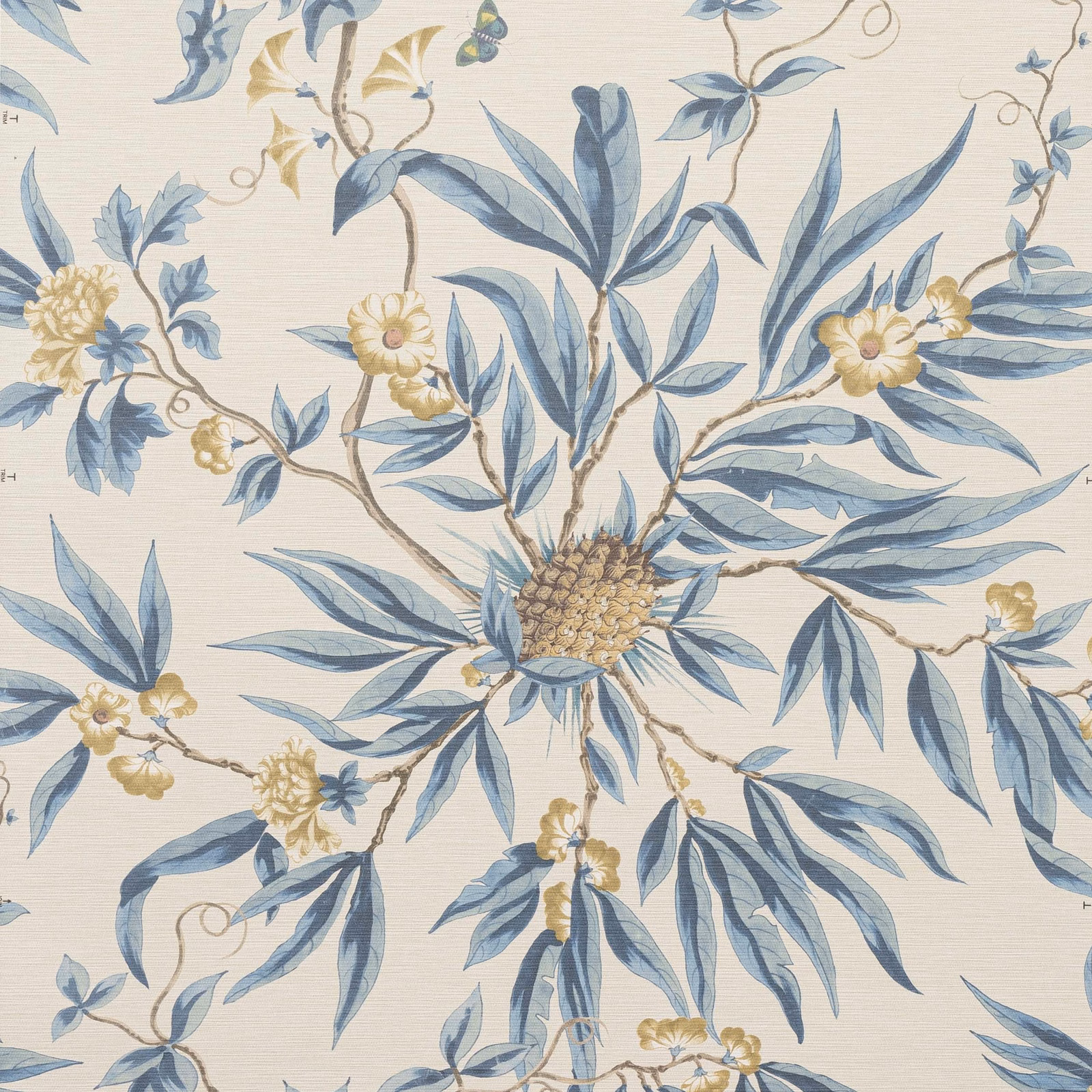 Blue leafy botanical wallpaper with ochre flowers on a softly textured cream ground