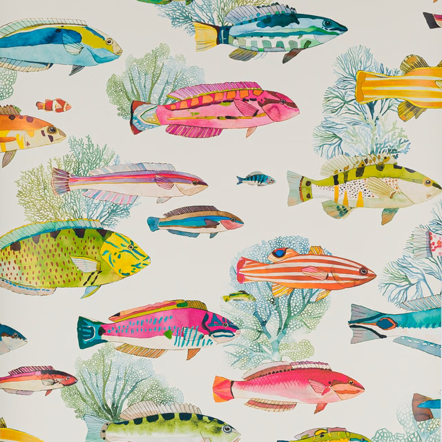 Coral pink, turquoise and yellow fish among delicate seaweed on an ivory ground