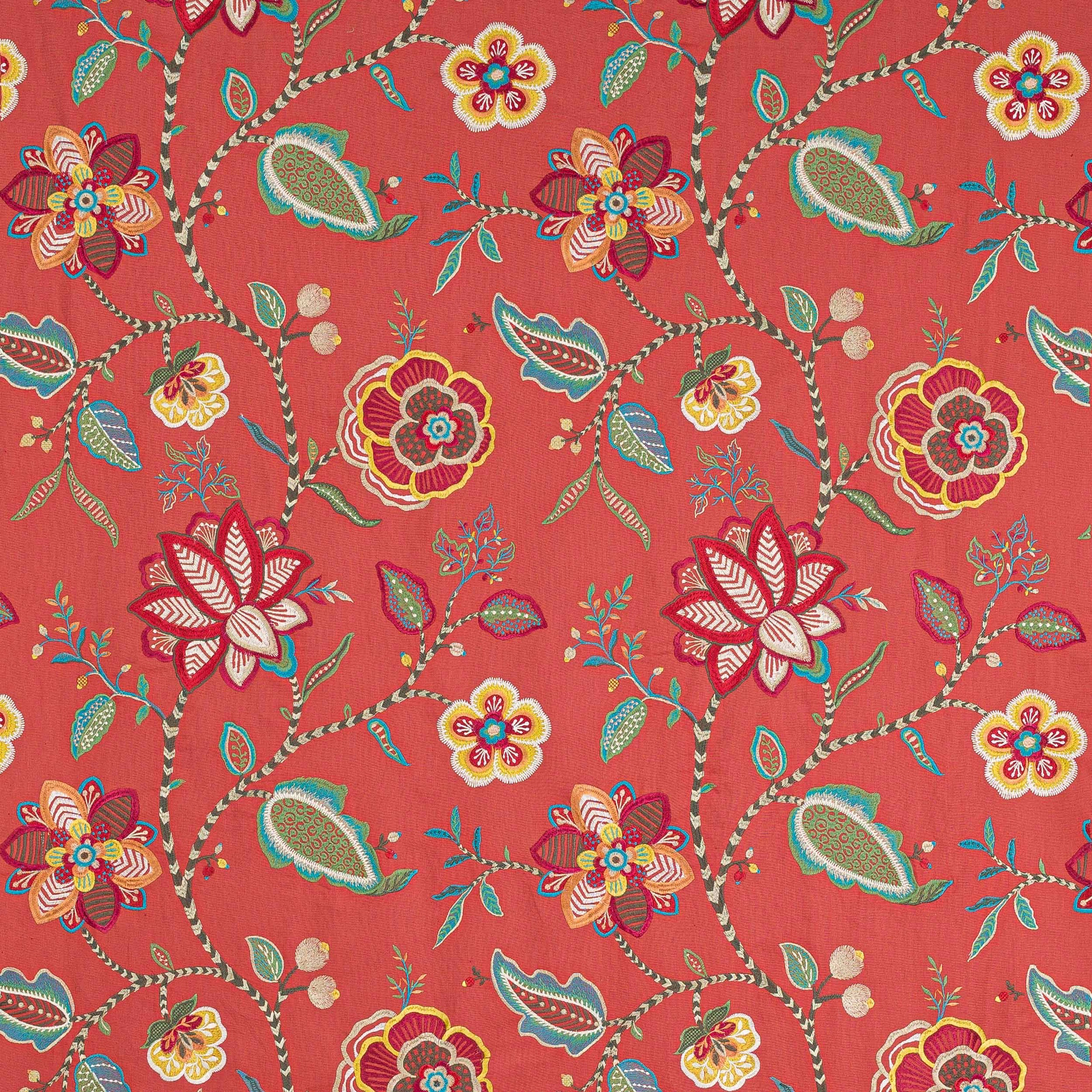 Coral red botanical fabric with large multicoloured flowers and winding vine stems