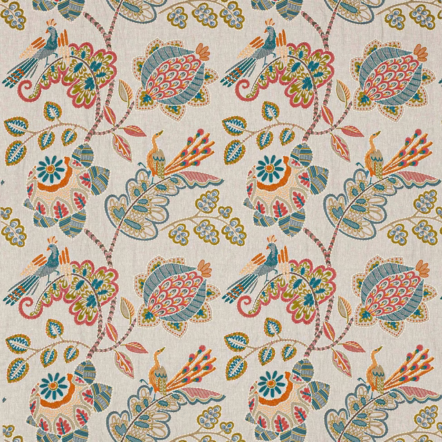 Embroidered floral and bird motif fabric in tomato red, slate, teal and ochre on a pale linen ground