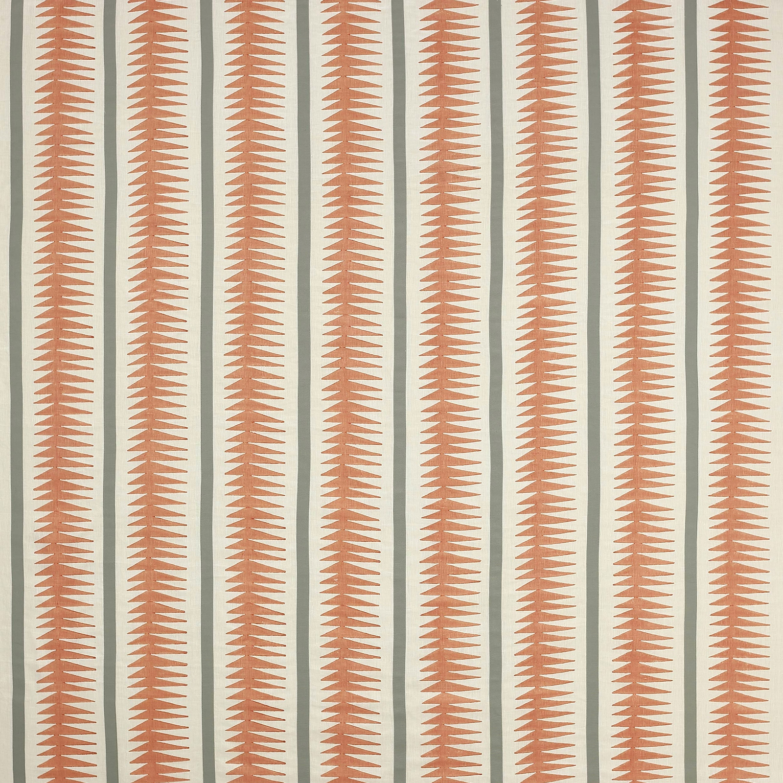 Vertical burnt orange serrated stripe fabric on a pale ground