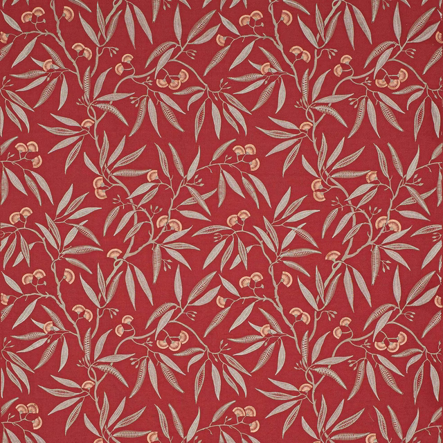Red botanical patterned fabric with pale leaf and blossom motifs