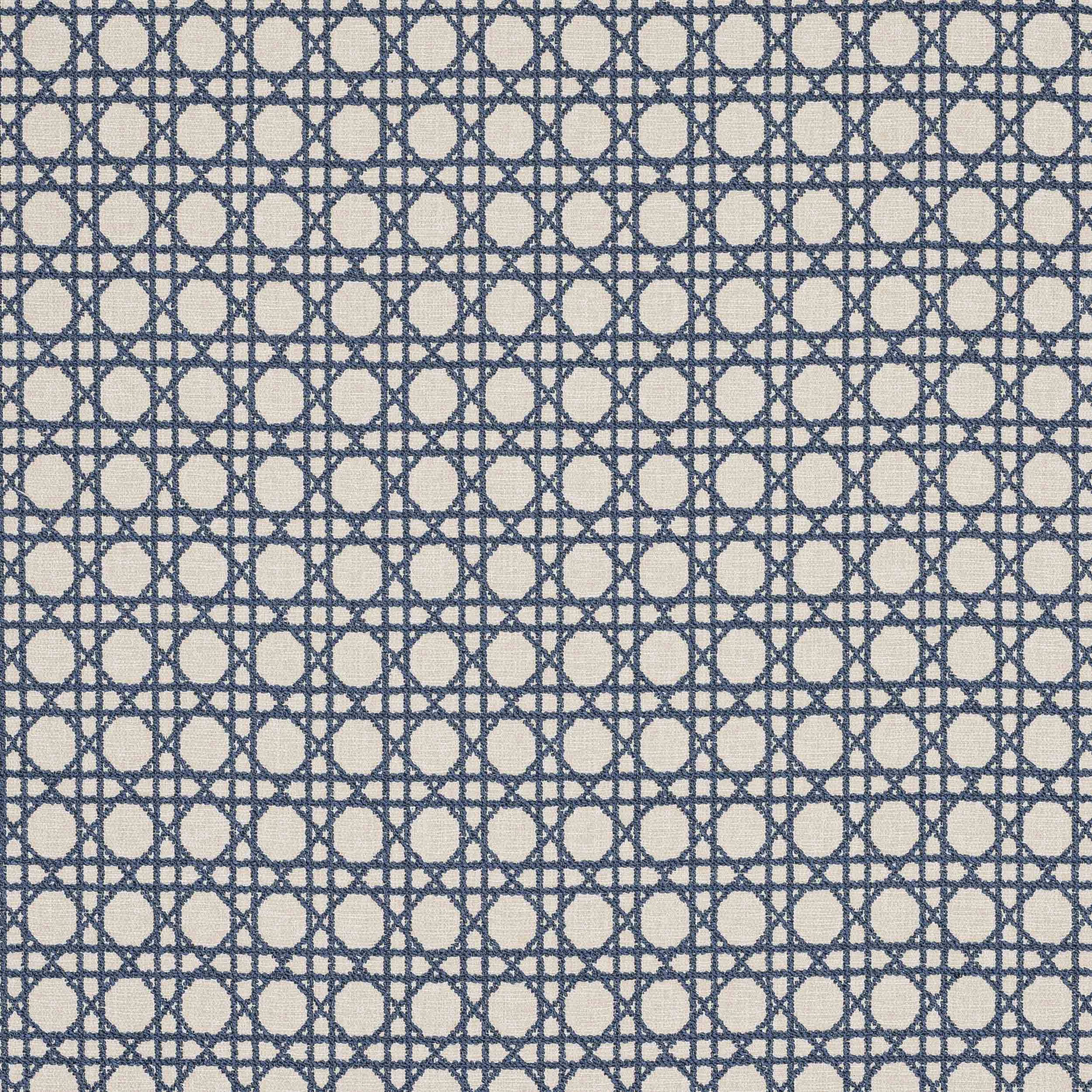 Slate blue geometric fabric with ivory oval motifs in a tight woven grid