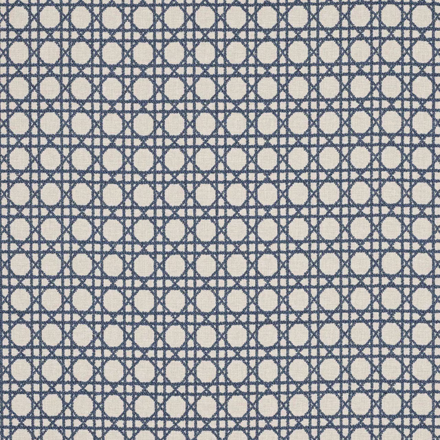 Slate blue geometric fabric with ivory oval motifs in a tight woven grid