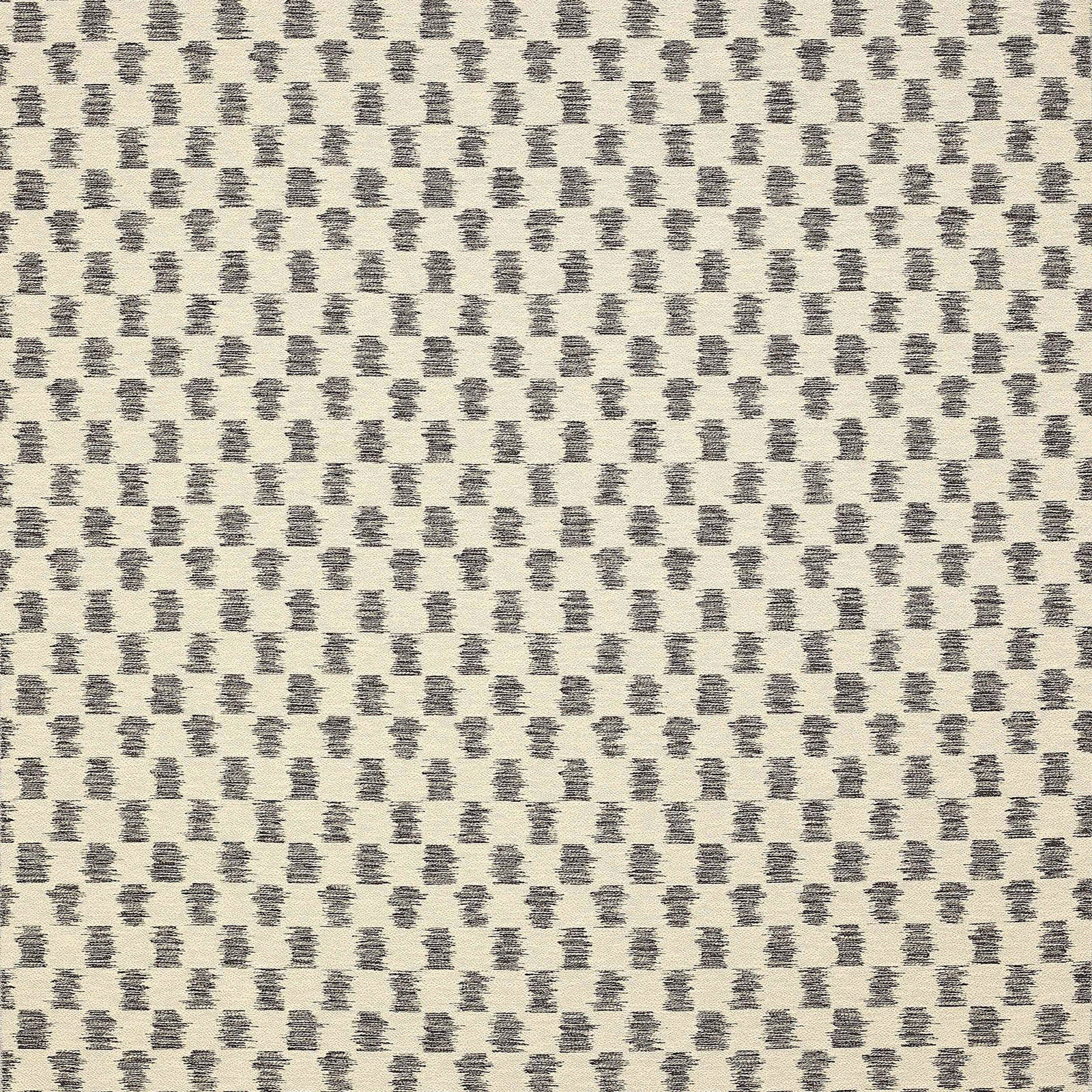 Close-up of Paxton fabric in charcoal grey dotted motif on ivory ground
