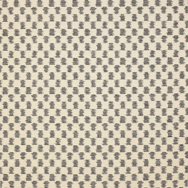 Close-up of Paxton fabric in charcoal grey dotted motif on ivory ground