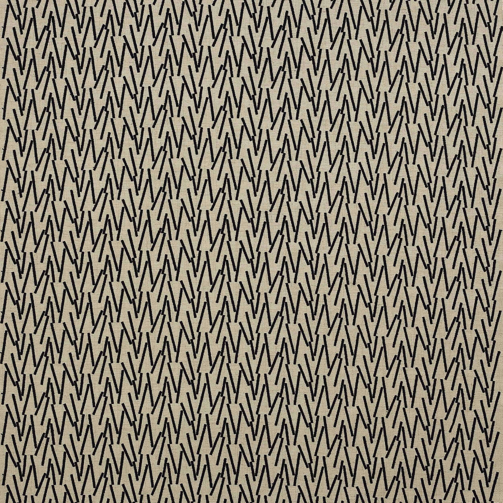 Black zigzag geometric fabric on a warm ivory ground, tightly repeated pattern