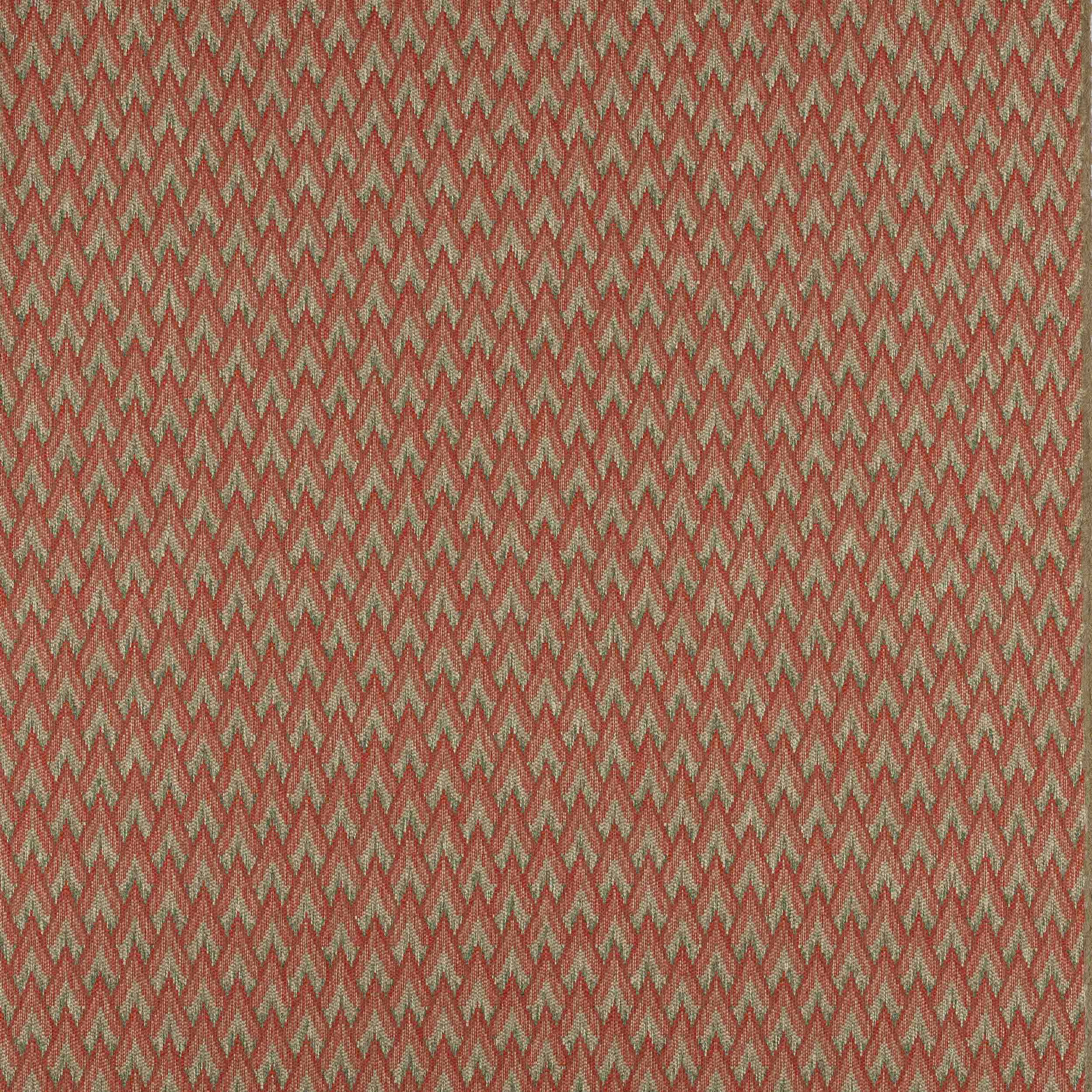 Close-up of a small zigzag check fabric in warm tomato red and muted green