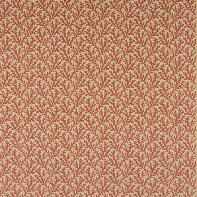 Small trailing pink motif on a warm cream-beige woven fabric swatch