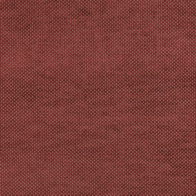 Close-up of muted brick red woven fabric with tiny checkerboard texture