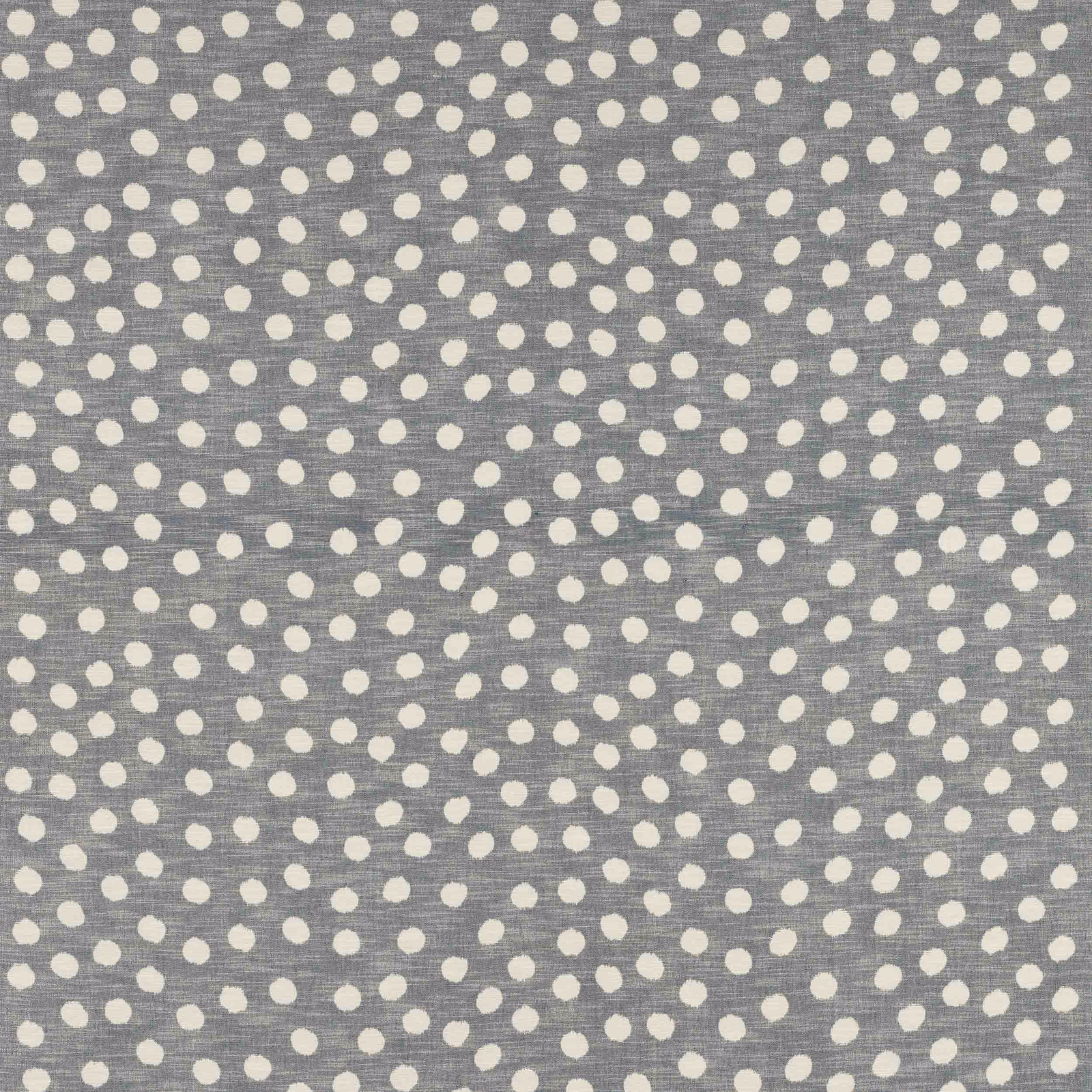 Grey cotton fabric with small cream polka dots and a dry woven texture