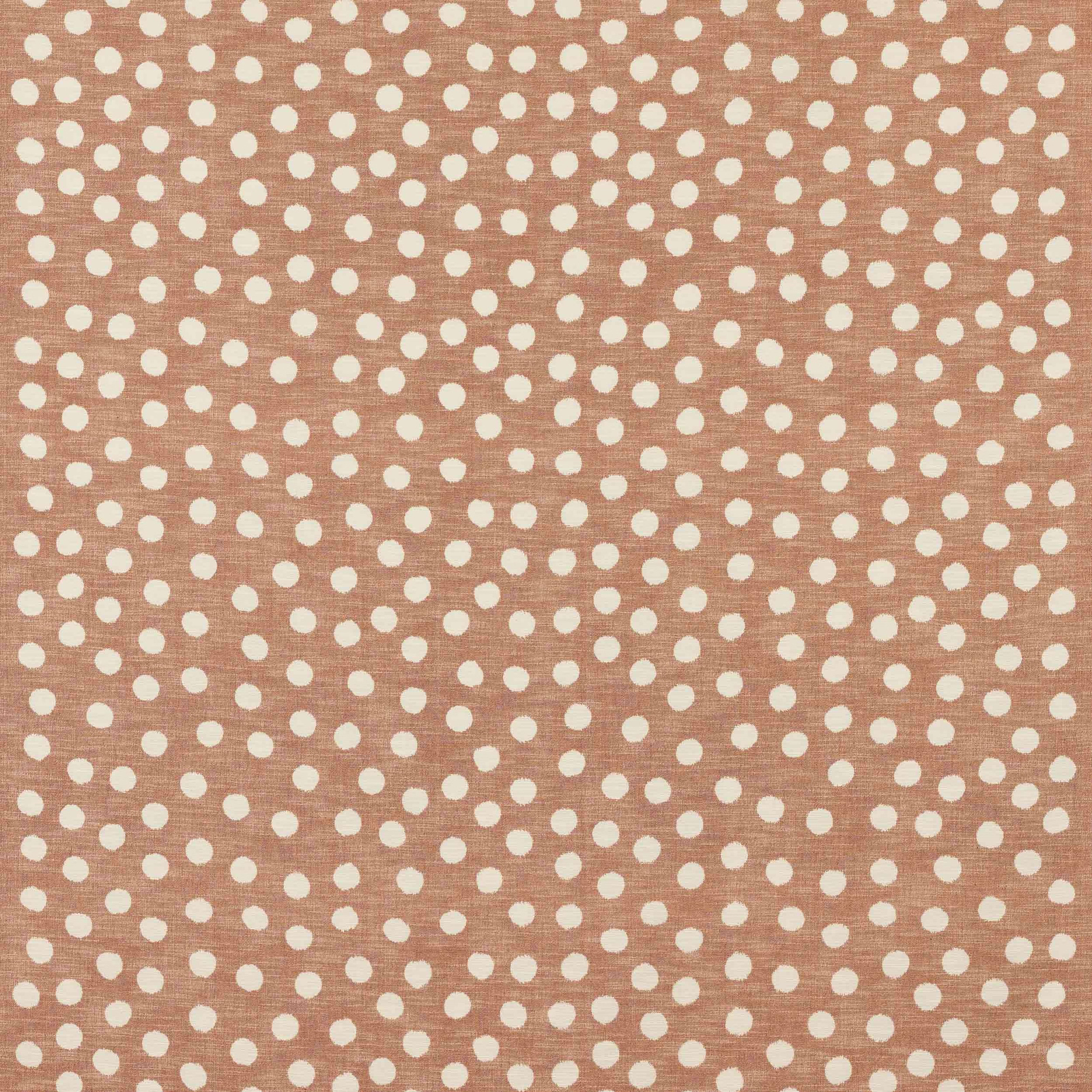 Dusty rose cotton fabric with small ivory polka dots and a subtle woven texture