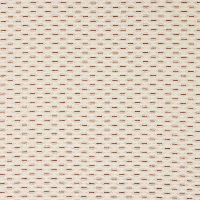 Cream fabric swatch with tiny terracotta dash pattern and subtle woven texture