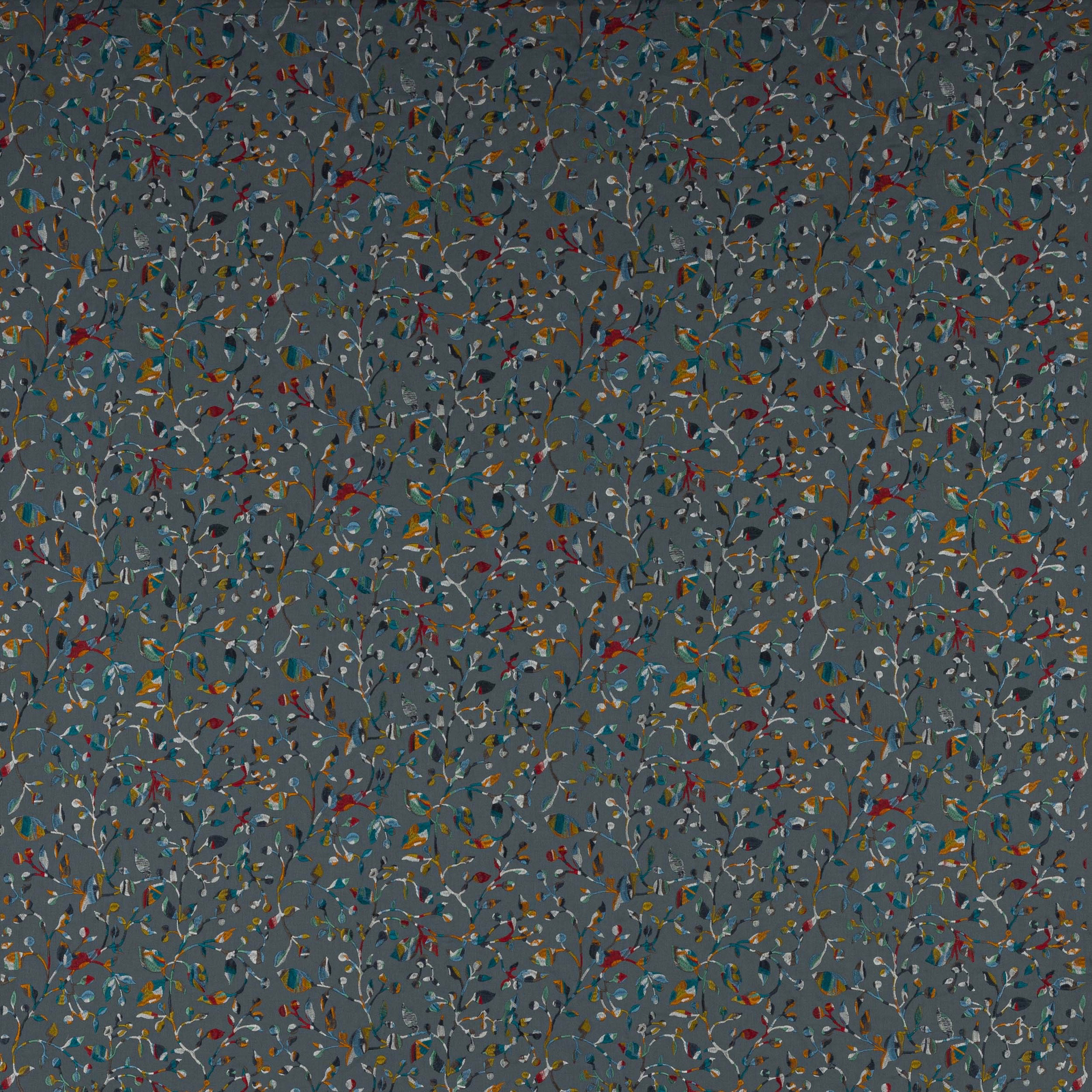 Slate blue-grey botanical fabric with tiny multicoloured leaves on a small trailing pattern