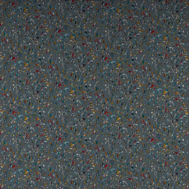 Slate blue-grey botanical fabric with tiny multicoloured leaves on a small trailing pattern