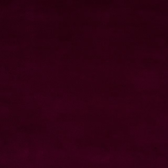 Deep plum velvet-like fabric swatch with a smooth, dark finish