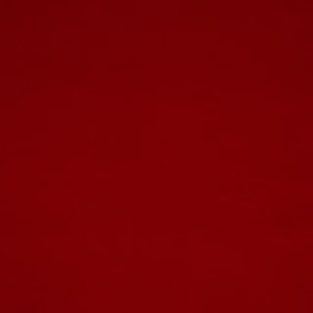 Deep écarlate red plain fabric swatch with a smooth, fine surface