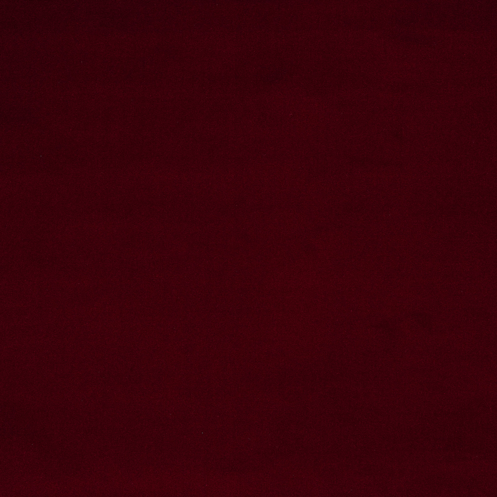 Deep framboise red plain woven fabric with a smooth, velvety surface