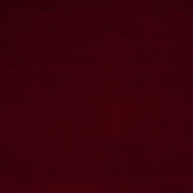 Deep framboise red plain woven fabric with a smooth, velvety surface