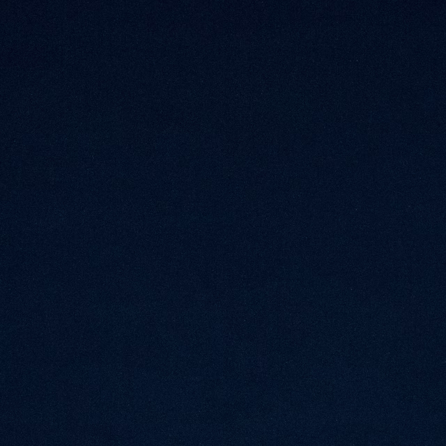 Deep indigo plain fabric swatch with a soft matte texture